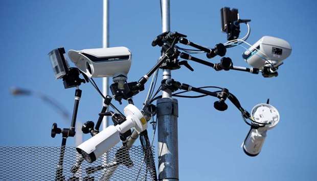 Surveillance cameras are pictured on a security fence near the site of the upcoming G7 leadersu2019 summit in Quebecu2019s Charlevoix region, in La Malbaie, Quebec, Canada.