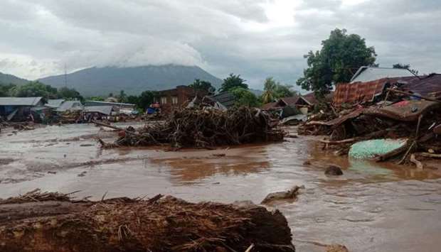 Damaged houses are seen at an area affected by flash floods after heavy rains in East Flores, East Nusa Tenggara province, Indonesia April 4, 2021 in this photo distributed by Antara Foto. (File photo: Reuters)