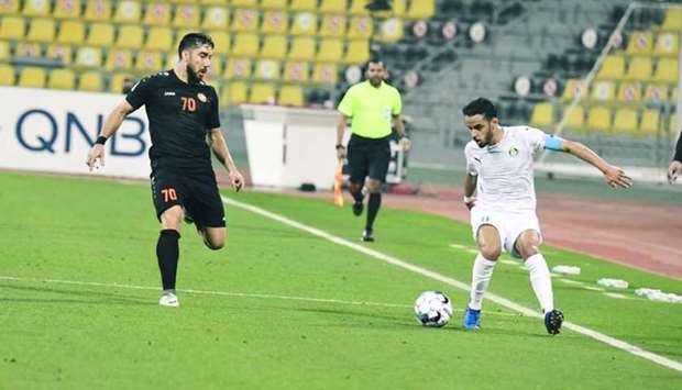 Al Gharafa's Othman al-Yahri (right) and Umm Salal's Ismail Mahmoud Mardanli in action during the QNB Stars League match at Suhaim Bin Hamad Stadium Saturday