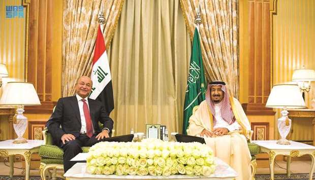 Saudi Arabiau2019s King Salman bin Abdul Aziz al-Saud meets with Iraqi Prime Minister Mustafa al-Kadhimi, in Riyadh, yesterday.