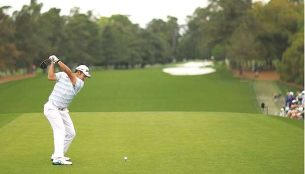 Hideki Matsuyama of Japan plays his shot from the first tee during the third round of the Masters at Augusta.