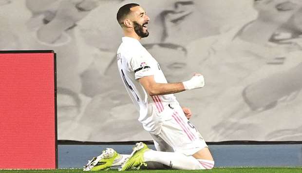 Real Madridu2019s Karim Benzema celebrates after scoring during the La Liga match against Barcelona at the Alfredo di Stefano stadium in Valdebebas, on the outskirts of Madrid, Spain, on Saturday. (AFP)