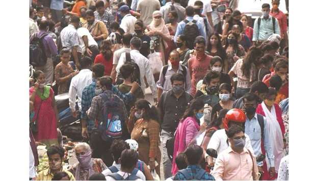 People are seen along a busy road in Mumbai yesterday, as India overtook Brazil as the country with the second-highest number of Covid-19 infections.