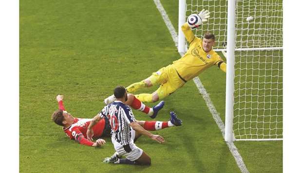 West Bromwich Albionu2019s Matt Phillips (centre) scores against Southampton during the Premier League match in West Bromwich, Britain, Sunday. (Reuters)
