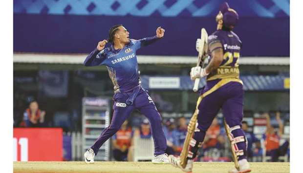 Rahul Chahar of Mumbai Indians celebrates the wicket of Nitish Rana (right) of Kolkata Knight Riders during their Indian Premier League match at the M. A. Chidambaram Stadium in Chennai yesterday. (Sportzpics for IPL)