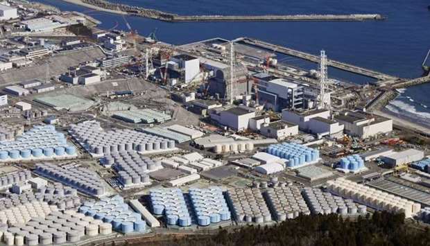 An aerial view shows the storage tanks for treated water at the tsunami-crippled Fukushima Daiichi nuclear power plant in Okuma town, Fukushima prefecture, Japan. Kyodo/via REUTERS