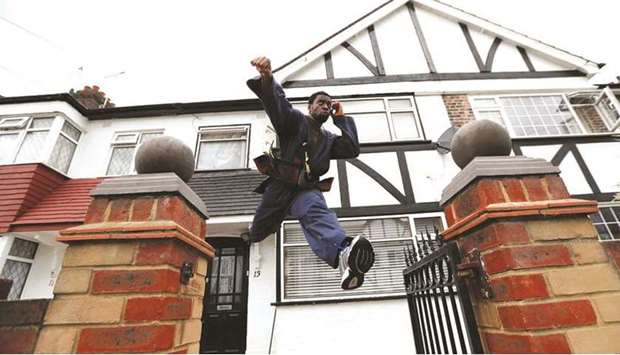 In this May 24, 2020, picture, taekwondo athlete Lutalo Mohamed trains at his home in Walthamstow in London, England. (Reuters)