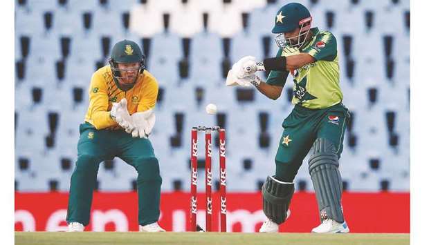 Pakistanu2019s Babar Azam (right) plays a shot as South Africau2019s wicketkeeper Heinrich Klaasen looks on during the third Twenty20 international match at SuperSport Park in Centurion yesterday. (AFP)