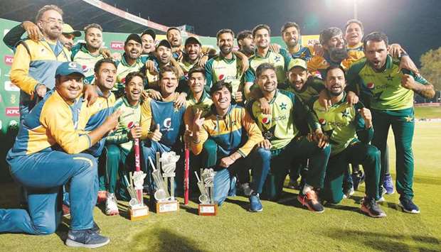Pakistan players and support staff celebrate after the T20 series win over South Africa at SuperSport Park in Centurion yesterday. (AFP)