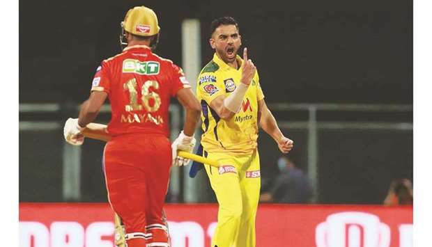 Deepak Chahar (right) of Chennai Super Kings celebrates after taking the wicket of Mayank Agarwal of Punjab Kings during the Indian Premier League in Mumbai yesterday. (Sportzpics for IPL)