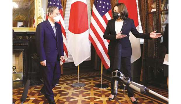 US Vice-President Harris with Japanese Prime Minister Suga in her ceremonial office in the Eisenhower Executive Office Building at the White House in Washington.