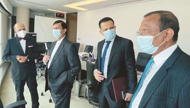 Doha Bank CEO Dr R Seetharaman and the Sri Lankan delegation during the meeting.rnrn