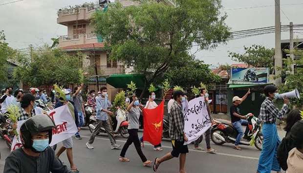 Protesters marching during a demonstration against the military coup in Mandalay. AFP/Anonymous Source