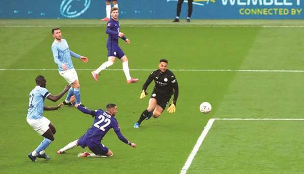 Chelseau2019s Hakim Ziyech (second right) scores against Manchester City in the FA Cup semi-final at the Wembley Stadium in London yesterday. (Reuters)