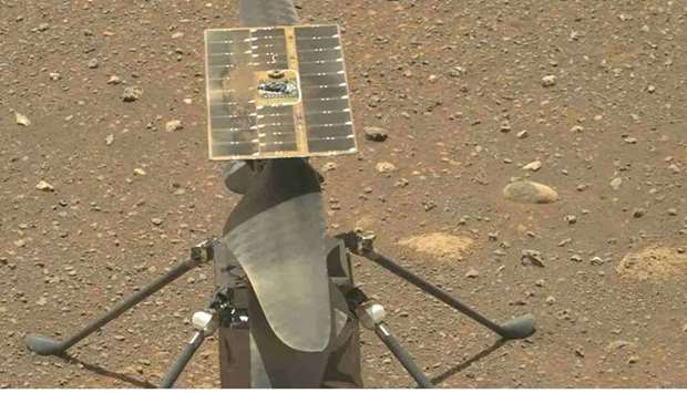 NASA's Ingenuity Mars Helicopter's carbon fiber blades can be seen in this video taken by the Mastcam-Z instrument aboard NASA's Perseverance Mars rover on April 8, 2021, the 48th Martian day, or sol, of the mission. AFP/NASA/JPL-Caltech