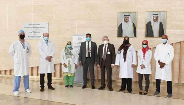 WWRCu2019s Acting Chief Executive Officer and Medical Director, Dr. Hilal Al Rifai poses in a group photo alongside Dr. Fatima Khatoon, WWRCu2019s consultant anesthesiologist with other team members involved in the project that was recognized