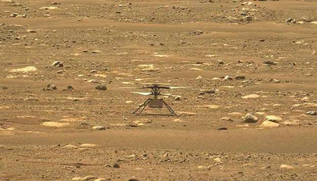 This Nasa photo obtained yesterday shows the agencyu2019s Ingenuity Mars Helicopter, right after it successfully completed a high-speed spin-up test, captured by the Mastcam-Z instrument on Perseverance on April 16. The image has been slightly processed (stretched and cropped).