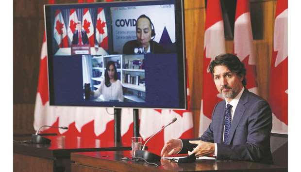 Prime Minister Trudeau listens to a reporteru2019s question during a news conference in Ottawa.