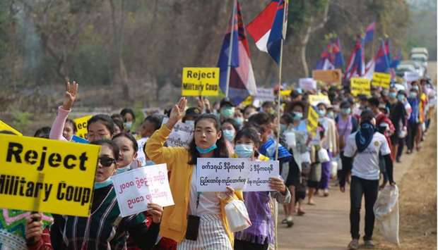 Ethnic Karen people taking part in an anti-military coup demonstration in Hlaingbwe township, in eastern Myanmar's Karen state.