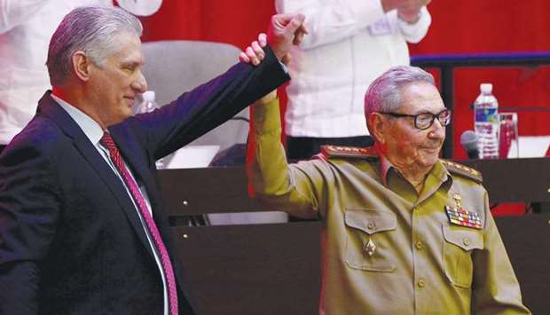 Diaz-Canel and Castro are seen during the closing session of the VIII Congress of the Communist Party in Havana.