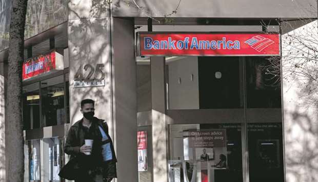 A pedestrian walks past a Bank of America bank branch in San Francisco. Bank of America held a conference last week to connect minority-run banks with companies that borrow in bond markets in an effort to increase diversity in debt underwriting.