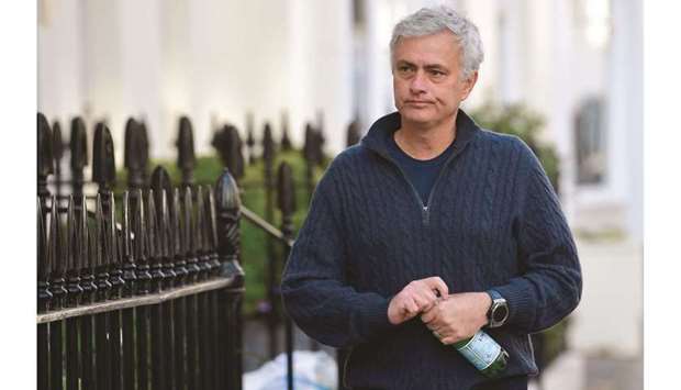 Jose Mourinho arrives at his home in London on Monday after being sacked by Tottenham Hotspur. (Reuters)