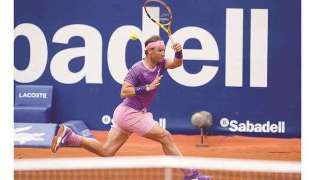 Spainu2019s Rafael Nadal returns the ball to Belarusu2019 Ilya Ivashka (not pictured) during their Barcelona Open match at the Real Club de Tenis in Barcelona, Spain, yesterday. (AFP)