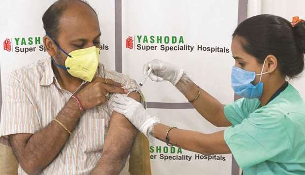 A medical worker inoculates a man with the dose of Covishield, AstraZeneca-Oxfordu2019s Covid-19 coronavirus vaccine at Yashoda hospital in Ghaziabad, yesterday.