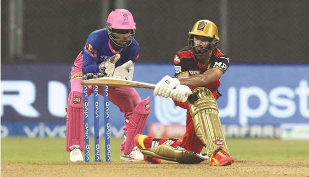RCBu2019s Devdutt Padikkal plays a sweep shot on way to his century against Rajasthan Royals yesterday.