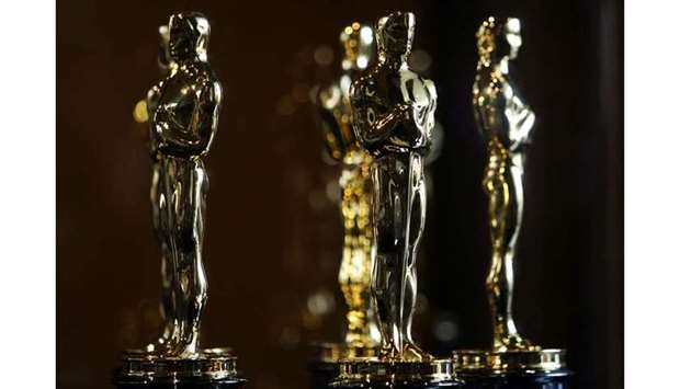 Oscar statuettes are displayed at the ,Meet The Oscars, exhibit before the 80th annual Academy Awards in Hollywood, California. February 21, 2008 file picture