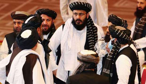 (File photo) Taliban delegates speak during talks between the Afghan government and Taliban insurgents in Doha, Qatar, recently. (Reuters)