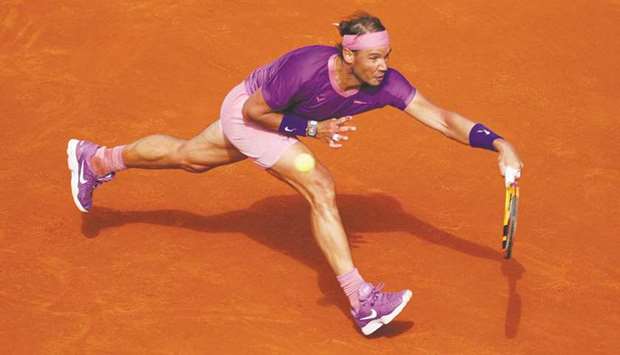 Spainu2019s Rafael Nadal makes a return during the Barcelona Open semi-final against compatriot Pablo Carreno Busta (not pictured) at the Real Club de Tennis Barcelona yesterday. (Reuters)