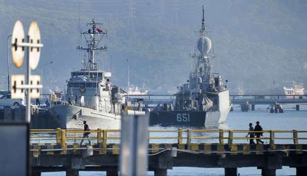 Indonesian Navy ships are seen at the naval base in Banyuwangi, East Java province as the military continues search operations off the coast of Bali for the Navy's KRI Nanggala submarine that went missing April 21 during a training exercise.