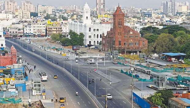 A partially deserted road is seen during lockdown imposed yesterday as a preventive measure against the spread of Covid-19 in Chennai yesterday.