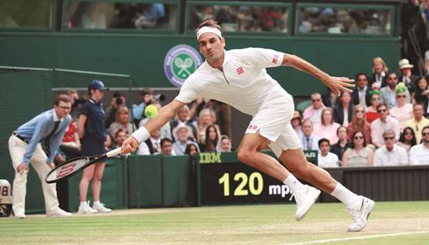 In this July 14, 2019, picture, Switzerlandu2019s Roger Federer attempts a return during the Wimbledon final against Serbiau2019s Novak Djokovic (not pictured) at the All England Lawn Tennis and Croquet Club in London, England. (Reuters)