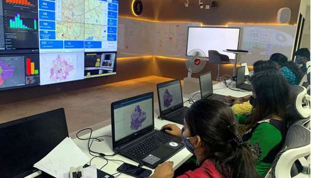 Software professionals assisting municipal authorities work on their terminals inside a ,war room, focused on tracking the spread of the coronavirus disease last year July 2 at the Bruhat Bengaluru Mahanagara Palike office in Bengaluru.