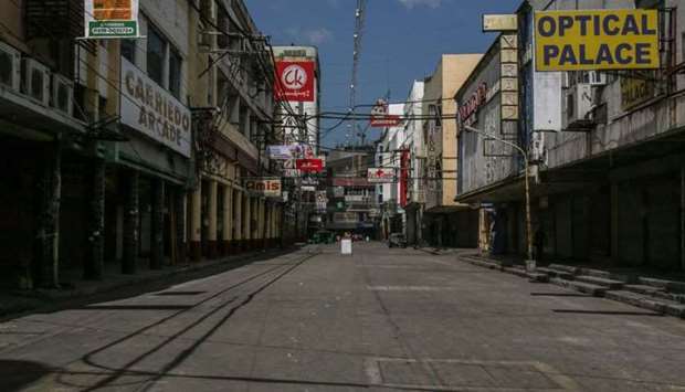 An empty street is seen at Quiapo district in Manila on March 29, on day one of government's imposing stricker lockdown, as hospitals in the capital struggle to cope with a surge in coronavirus infections.. AFP