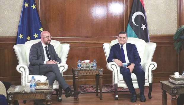 Libyau2019s interim prime minister Abdul Hamid Dbeibah (right) meets with European Council President Charles Michel at the presidential council headquarters in the capital Tripoli, yesterday.