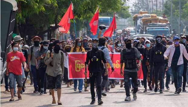 Protesters taking part in a demonstration against the military coup in Mandalay