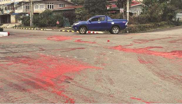 Red paint splashed on a road by protesters, representing blood spilled during demonstrations against the military coup, in Taunggyi in Myanmaru2019s Shan state.
