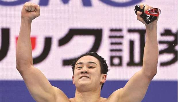 Japanu2019s Shoma Sato reacts after winning the menu2019s 200m breaststroke final during the Japan National Swimming Championships, which doubles as a qualifier event for the 2020 Tokyo Olympics, at the Tokyo Aquatics Centre yesterday. (AFP)