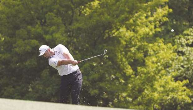 Jon Rahm plays a shot on the 11th hole during a practice round prior to the Masters at Augusta National Golf Club yesterday. (AFP)
