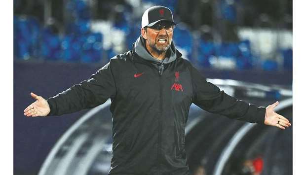 Liverpoolu2019s manager Jurgen Klopp reacts during the UEFA Champions League quarter-final match against Real Madrid in Madrid on Tuesday. (AFP)