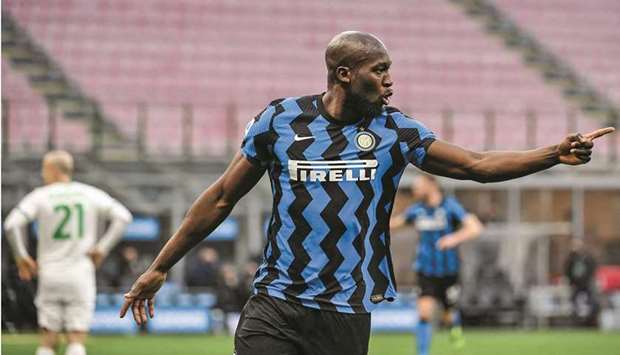 Inter Milanu2019s Romelu Lukaku celebrates after opening scoring against Sassuolo during the Serie A match in Milan yesterday. (AFP)