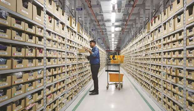 An employee works at an Amazon Fulfillment Centre on the outskirts of Bengaluru, India (file).
