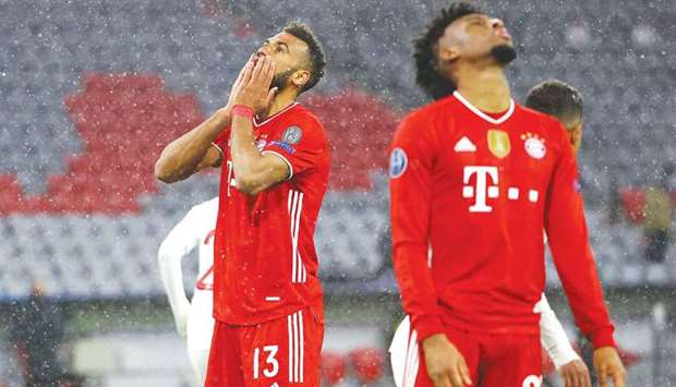 Bayern Munichu2019s Eric Maxim Choupo-Moting (left) and Kingsley Coman react after their loss to Paris St Germain in the Champions League quarter-final first leg in Munich on Wednesday night. (Reuters)