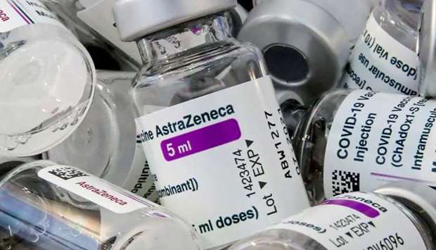 Empty vials of Oxford/AstraZeneca's Covid-19 vaccine are pictured amid a vaccination campaign in Bierset, Belgium March 17, 2021