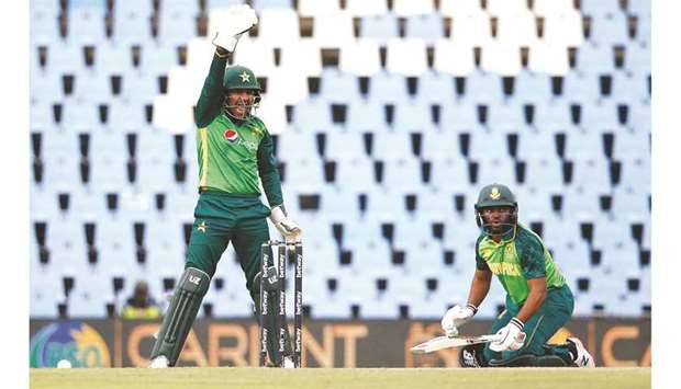 Pakistanu2019s Sarfaraz Ahmed (left) unsuccessfully appeals for the dismissal of South Africau2019s captain Temba Bavuma during the third ODI at SuperSport Park in Centurion, South Africa, on Wednesday. (AFP)