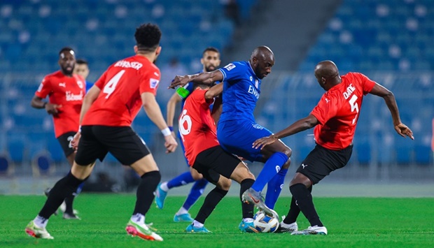 Al Rayyan and Al Hilal players in action during the Group A match of the AFC Champions League at the Prince Faisal bin Fahd Stadium in Riyadh on Monday.
