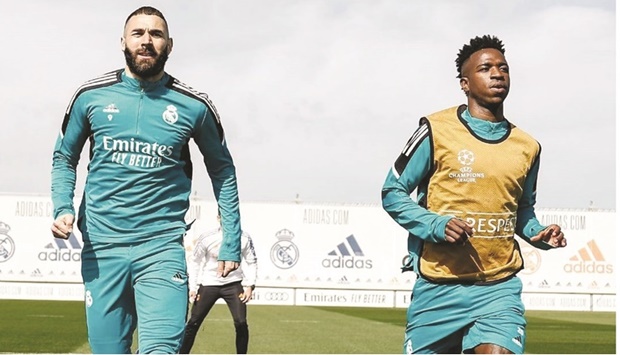 Real Madridu2019s Vinicius Junior (right) and Karim Benzema train in Madrid yesterday, on the eve of their Champions League quarter-final second leg match against Chelsea.